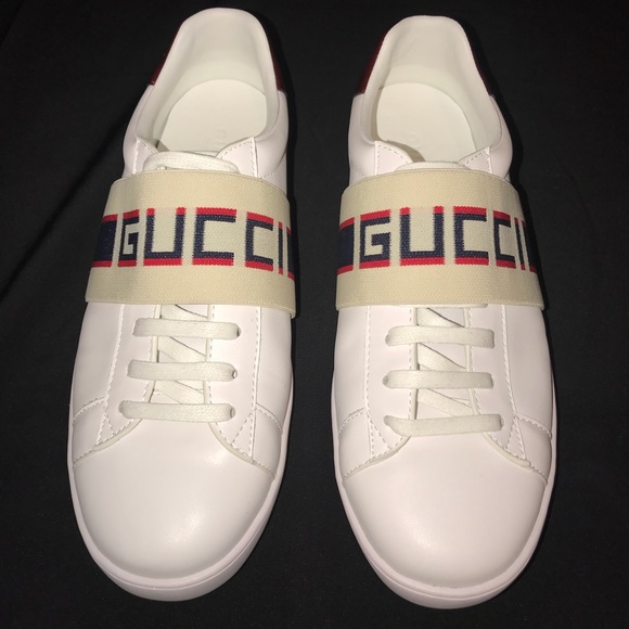gucci stripe leather sneaker on feet